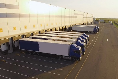 warehouse with trucks awaiting loading