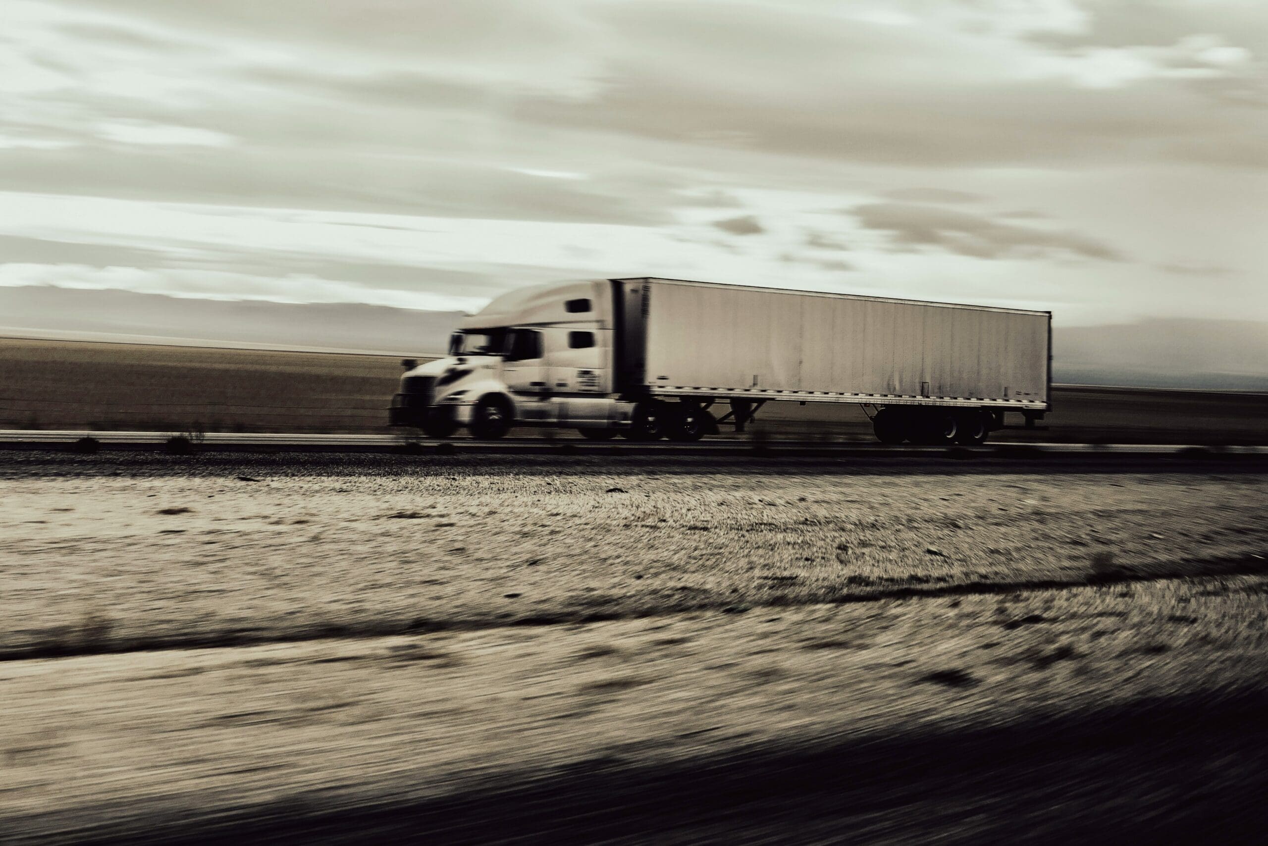 tractor trailer covered by auto liability travels on road